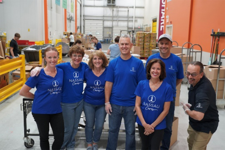 Tom Buckingham and other Nassau Group employees volunterring at the Connecticut Foodshare